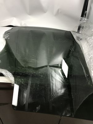 Cái kính tay phải khỏa thân phía sau.